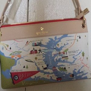 BRAND NEW leather bag with playful map design.